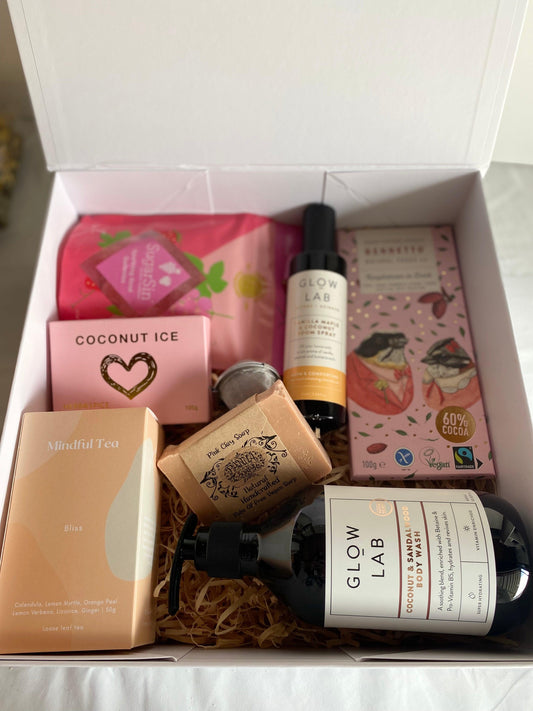 Glow lab Body wash, Bennetto Raspberry dark chocolate, pana vegan soap, glow lab room spray, coconut ice candy, mindful tea and strainer , watermelon mojito gummies all packaged in a beautiful magnetic box with ribbons and personalized message. christchurch new zealand