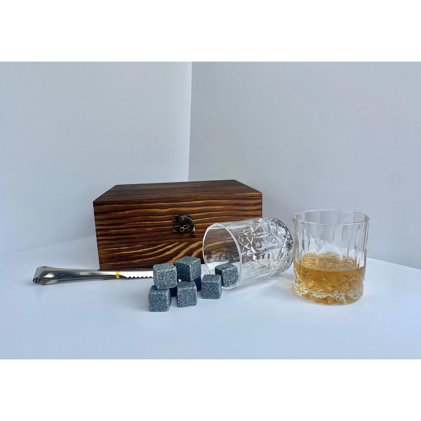 whiskey rocks set containing 8 stone rocks to keep your drinks cold, 2x glass tumblers, silver ice tongs all packaged in a distressed wooden hinged box,  Gratefully gifted Christchurch new zealand